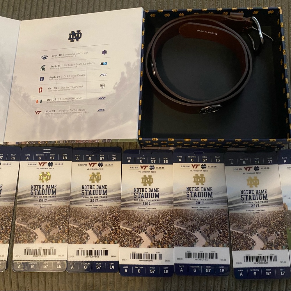 Norte Dame football memorabilia. Belt and tickets from previous years.
